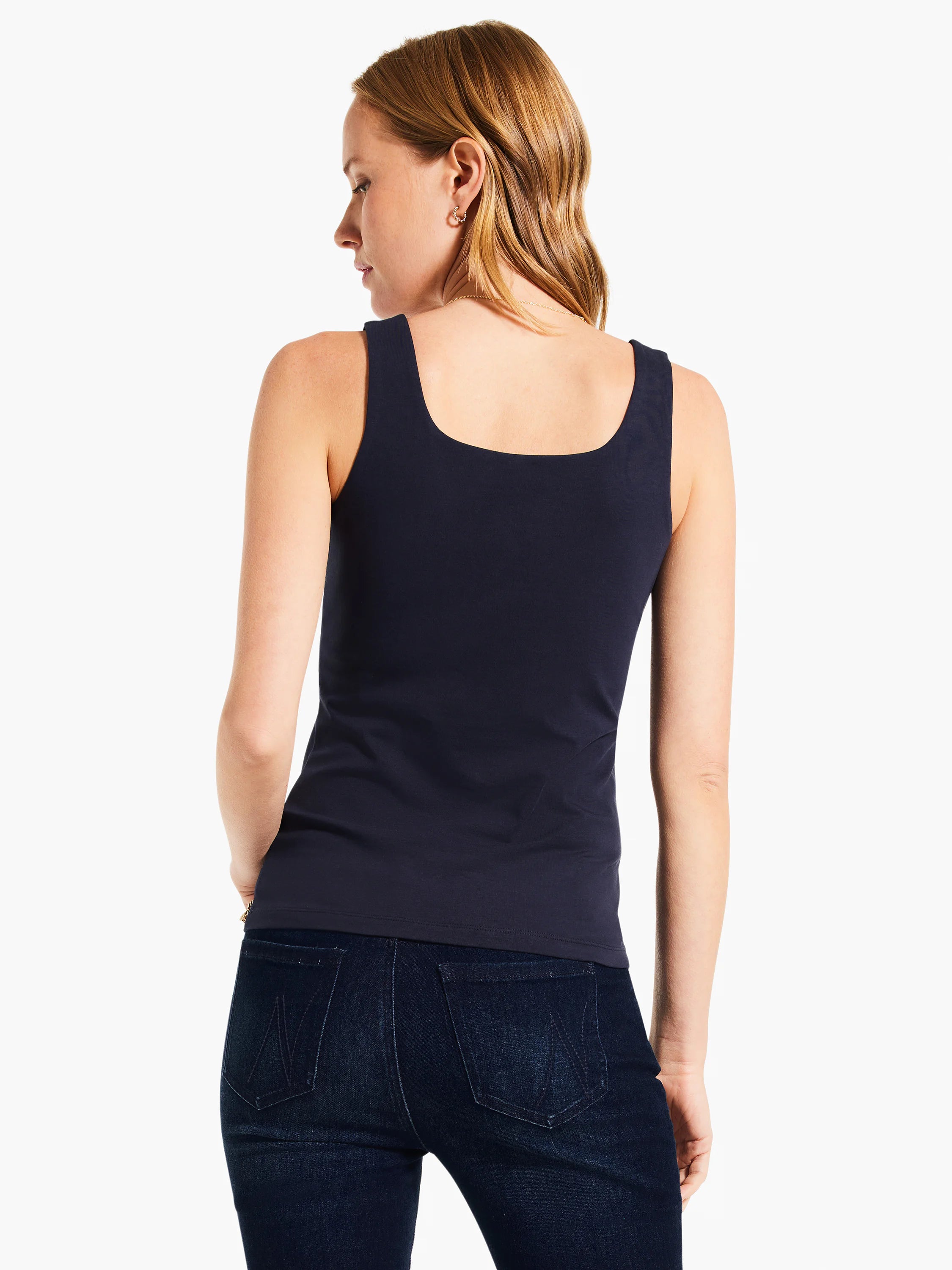 Navy blue fitted tank top with a square back neckline, worn by a woman facing away.