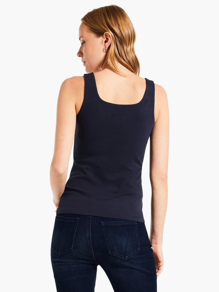 Navy blue fitted tank top with a square back neckline, worn by a woman facing away.