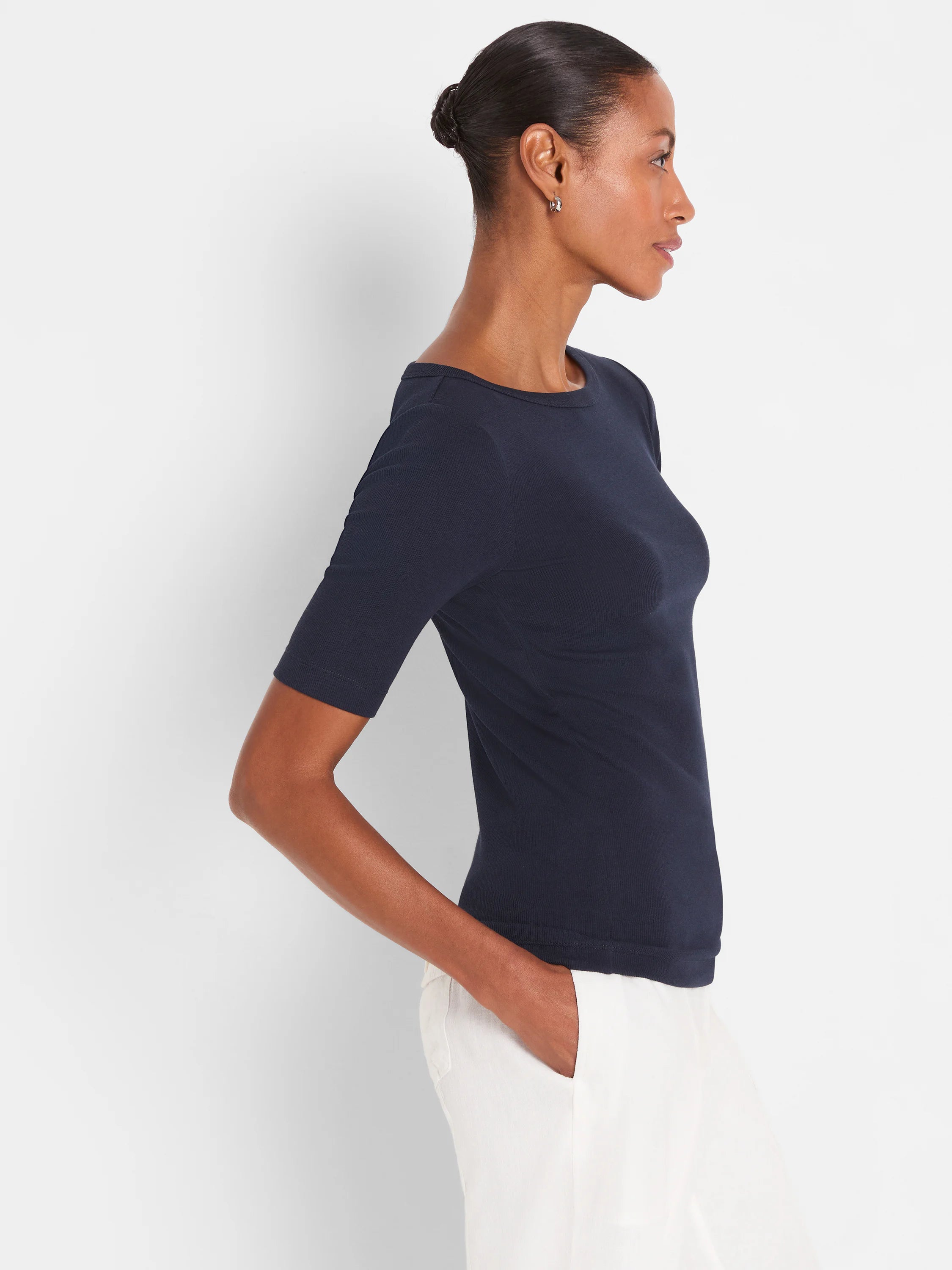 Navy blue ribbed knit tee with a boatneck and elbow sleeves, fitted on a model.