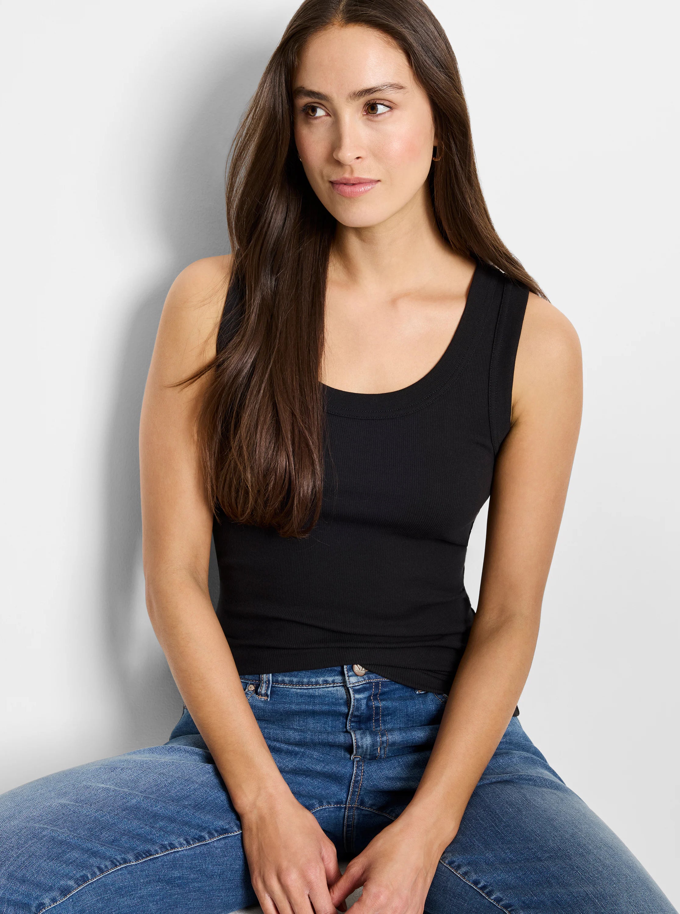 Black, ribbed knit scoop neck tank top; close-fitting.