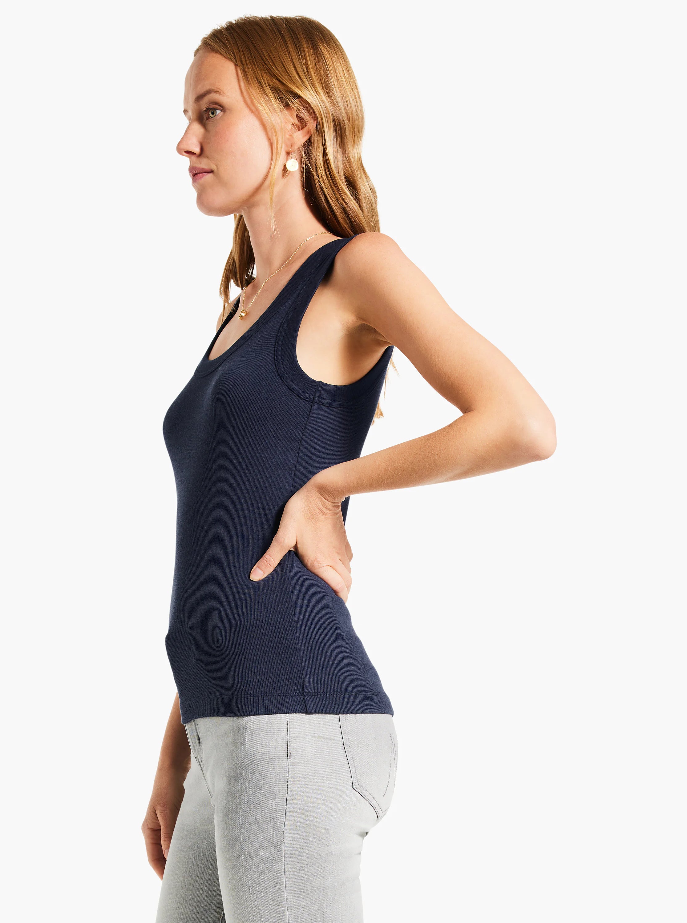 Dark navy blue ribbed knit scoop tank, close-fitting.
