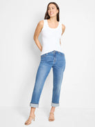 White ribbed knit scoop neck tank, form-fitting.