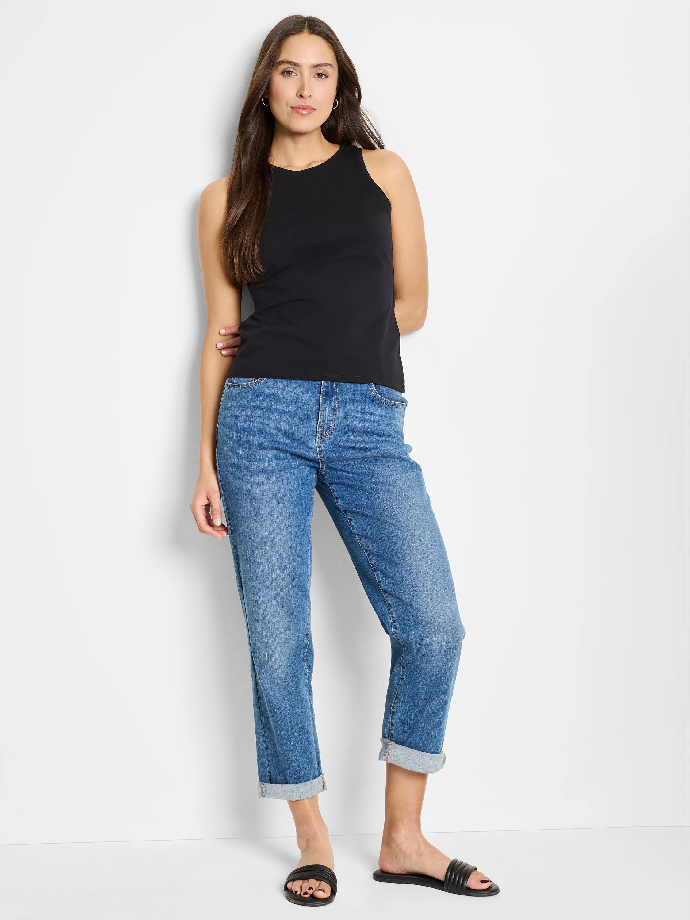 Black high-neck sleeveless tank top.