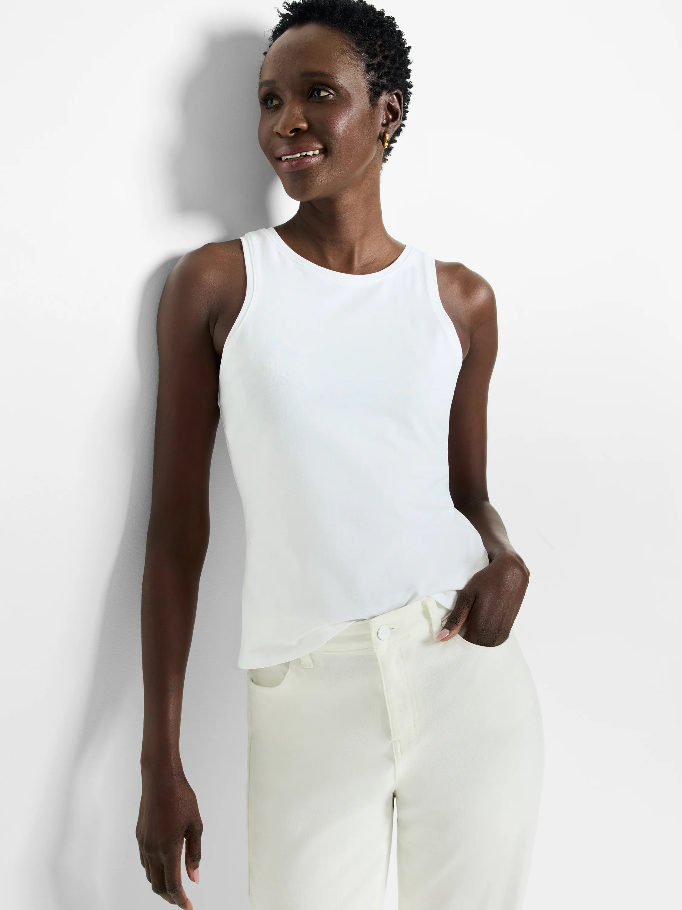 White high neck sleeveless tank top with a smooth texture and fitted silhouette.