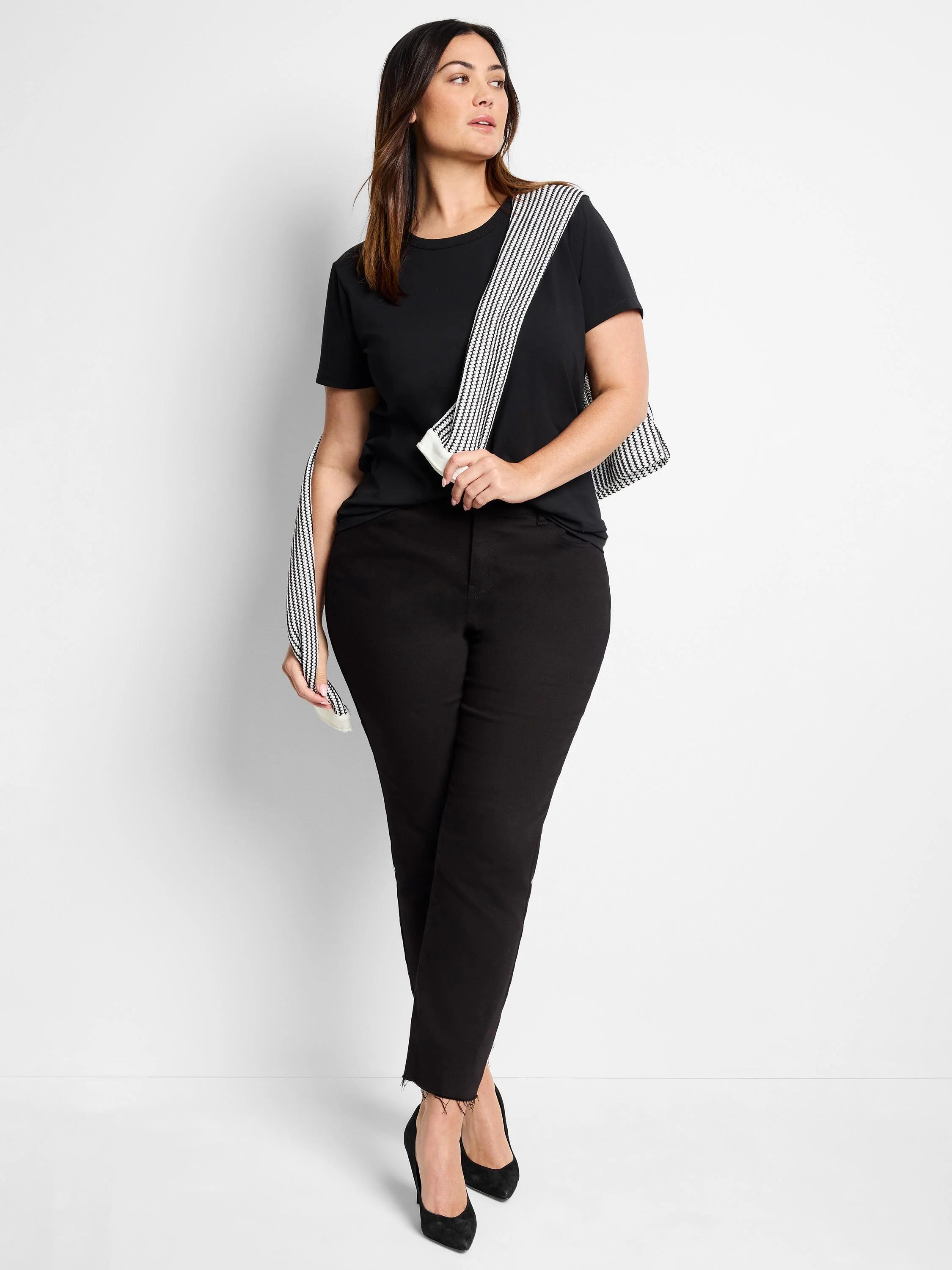 Black crew neck t-shirt with short sleeves.