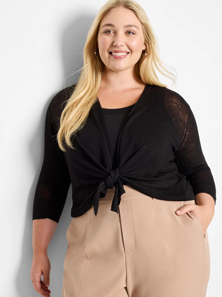 Black cardigan with 3/4 sleeves, tied at the front. Features a fine, slightly sheer knit fabric.