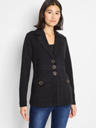 Black knit blazer with lapels, gold-rimmed black buttons on the front, and two patch pockets.
