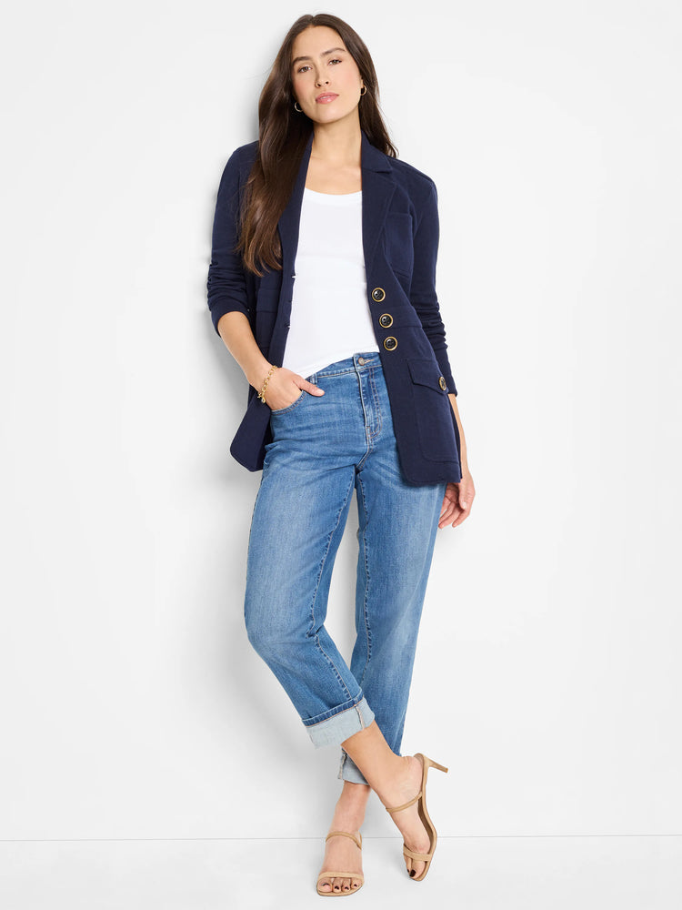 Navy knit blazer with notched lapels, three gold-rimmed dark buttons, and two buttoned front patch pockets.