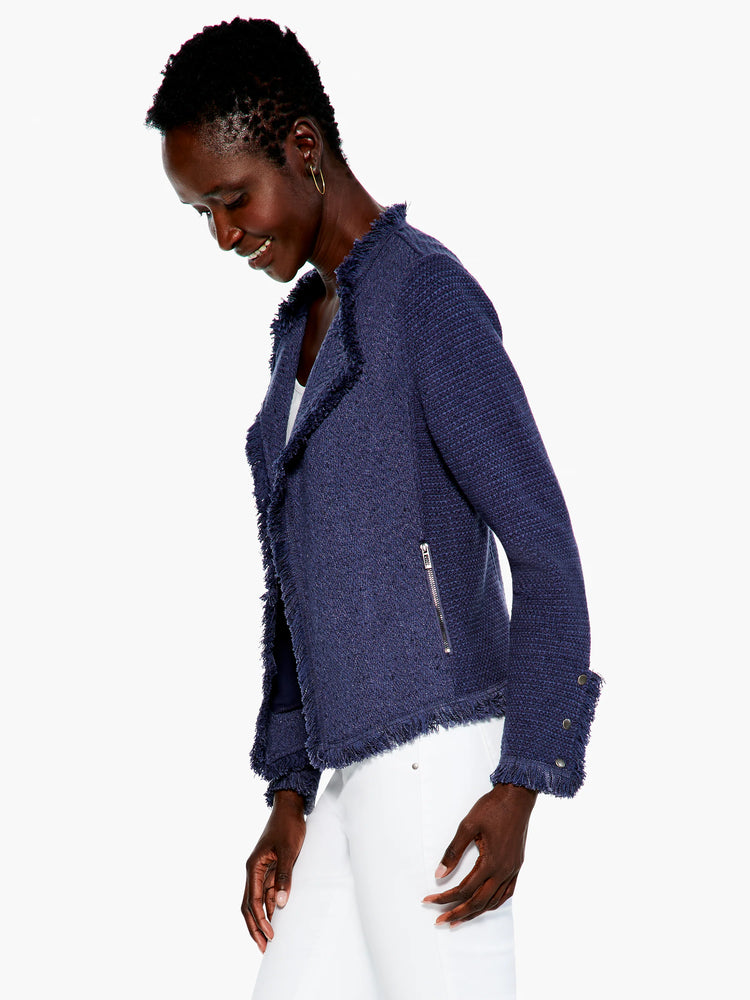 Deep blue mixed knit jacket with fringe trim on lapels, hem, and cuffs. Features zipper pocket and cuff buttons.