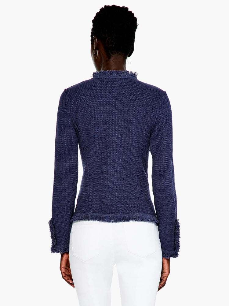 Indigo mixed knit jacket with fringed collar, cuffs, and hem.