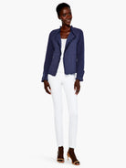 Navy blue knit jacket with fringe detailing on the collar, front, and cuffs.