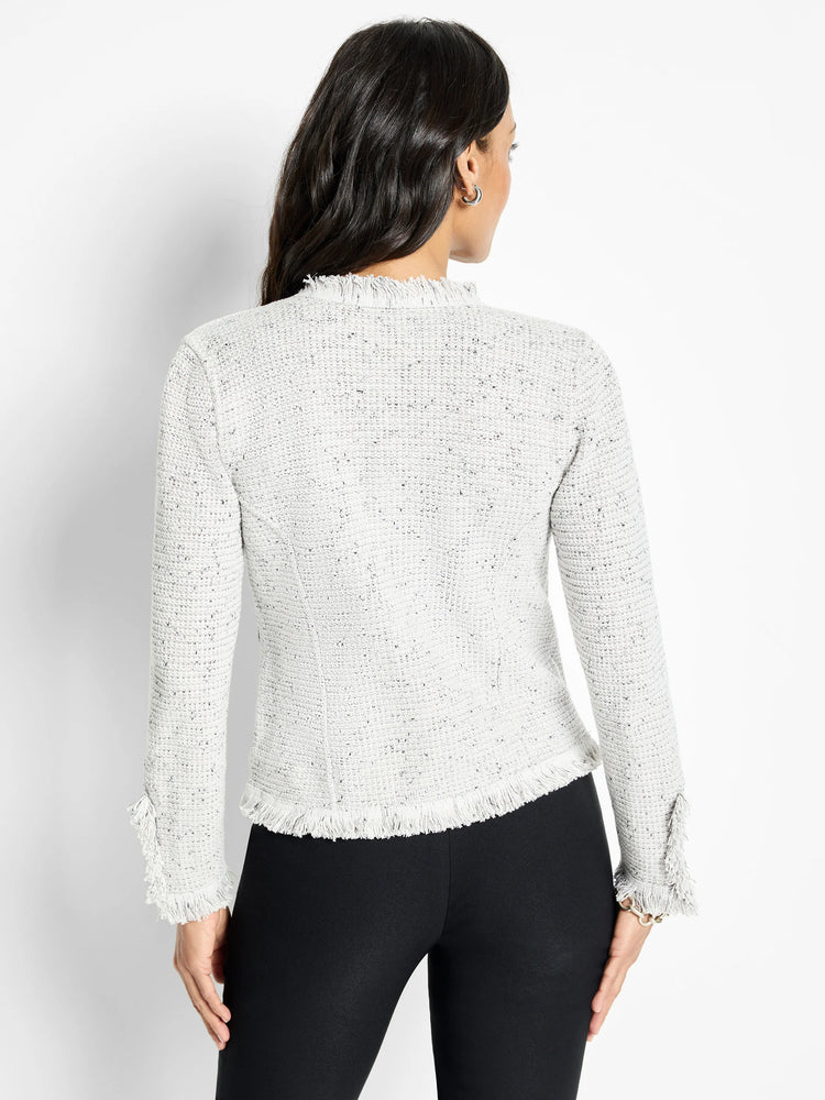 Speckled light gray mix knit jacket with fringe at collar, hem, and cuffs. Model seen from back.