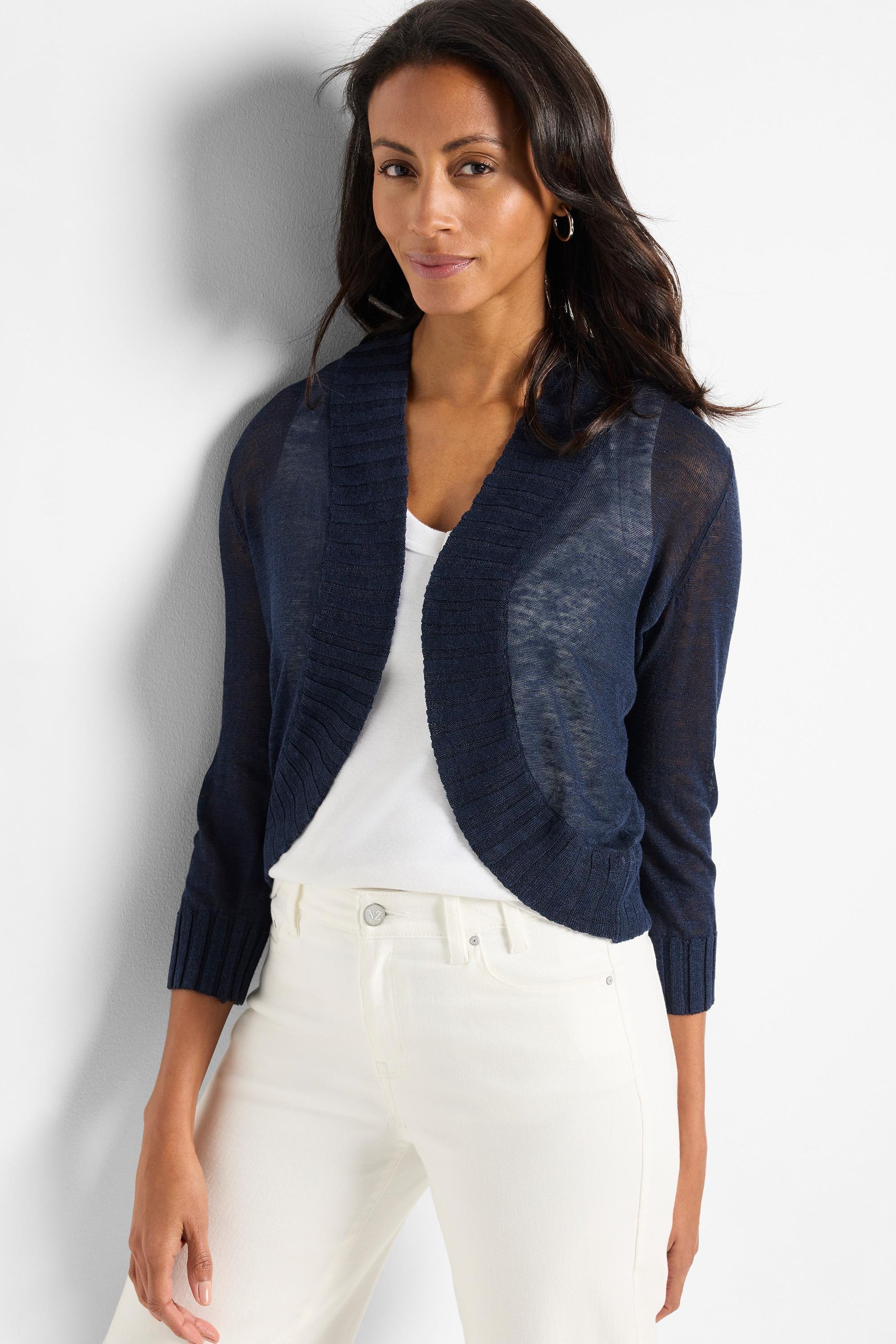 Dark navy sheer shrug with 3/4 sleeves and a cropped fit features a wide ribbed collar and open front styling.