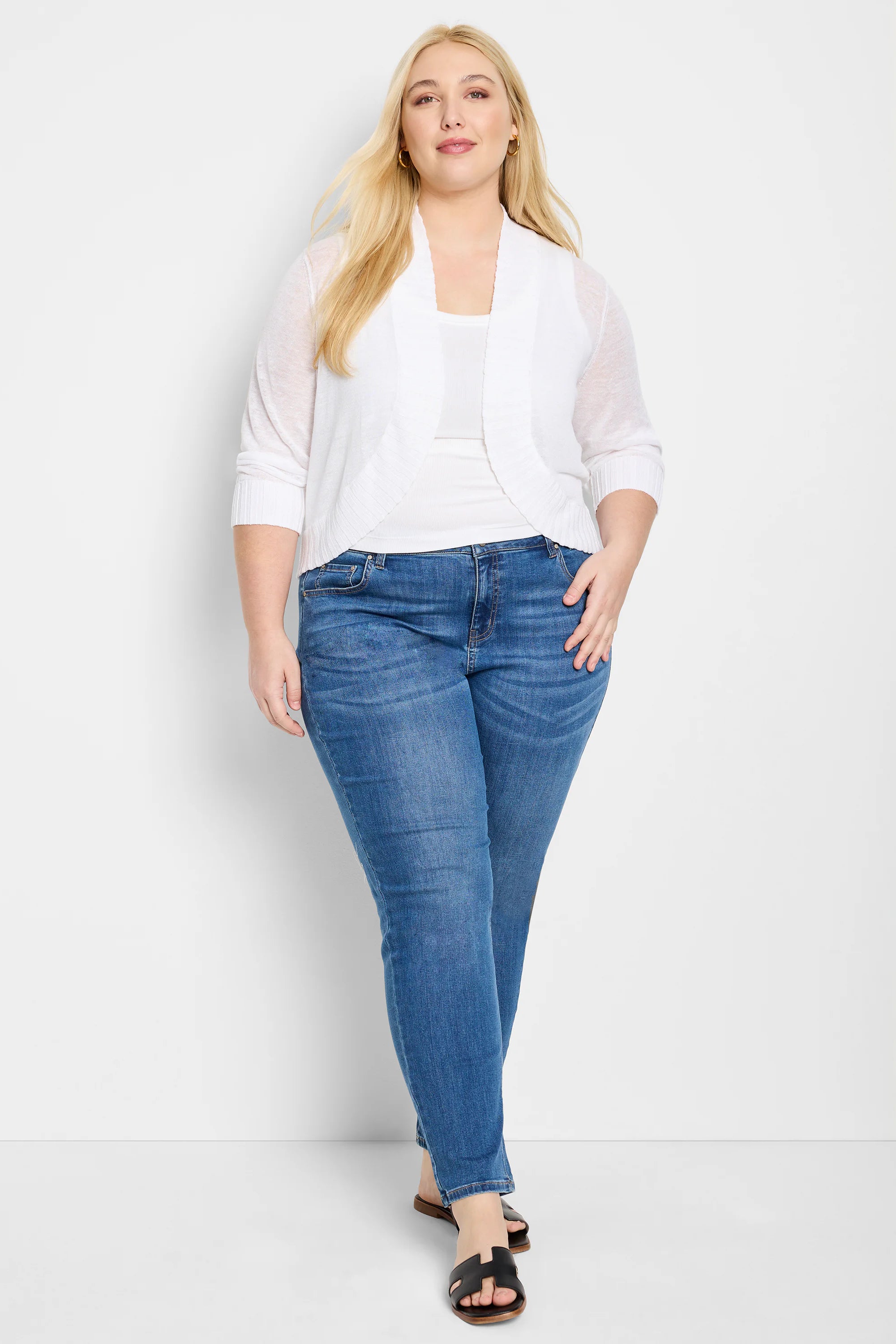 White sheer knit bolero cardigan, open front, with 3/4 ribbed sleeves.