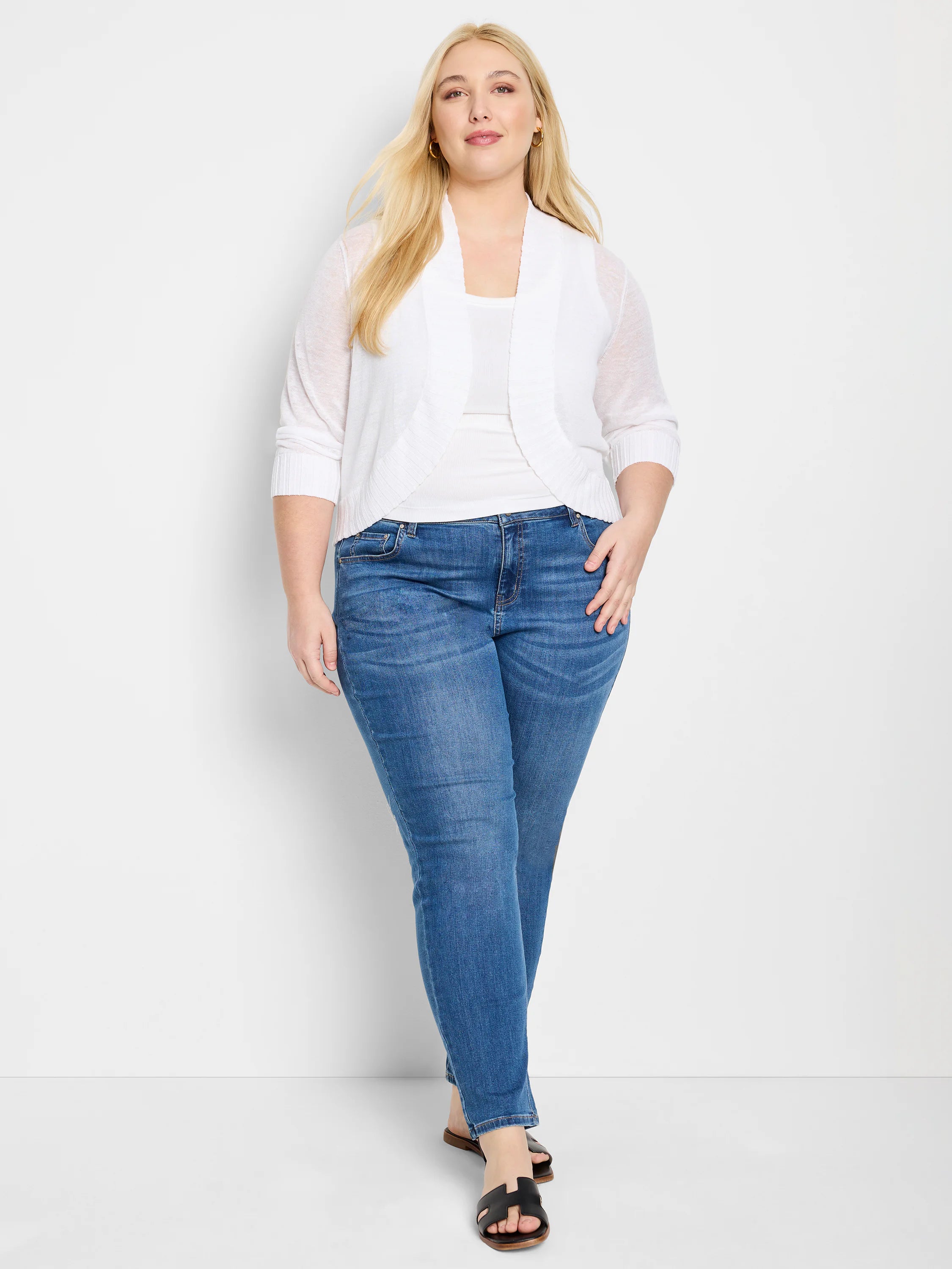 White sheer knit bolero cardigan, open front, with 3/4 ribbed sleeves.