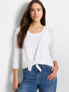 White long-sleeve cardigan with ribbed cuffs, tied at the waist.