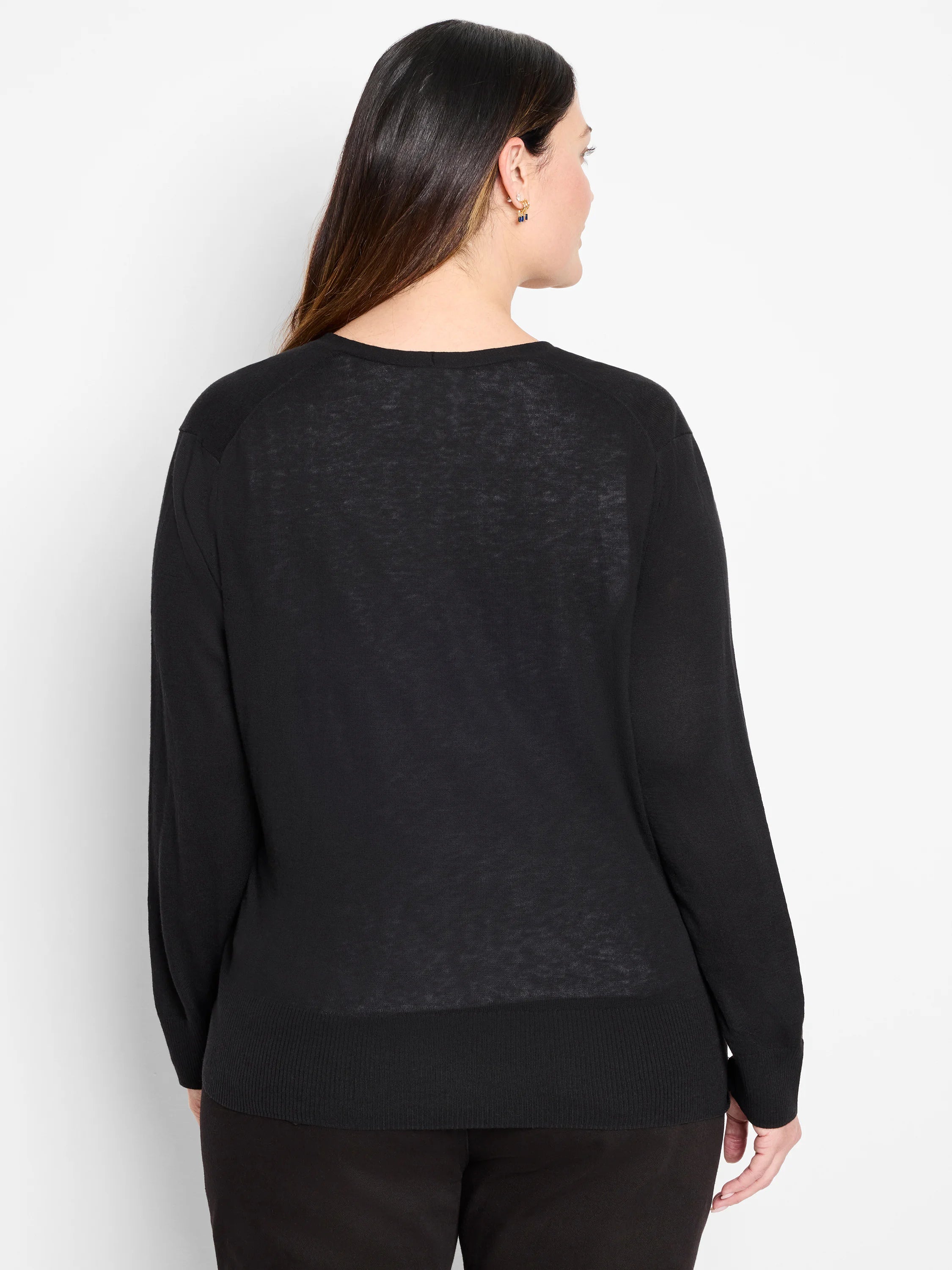 Black long-sleeve cardigan, rear view. Lightweight, slightly sheer knit with ribbed cuffs and hem.