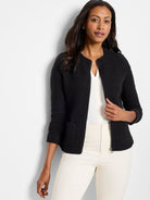 Black weave knit zip jacket with collarless neckline, silver zipper, and front patch pockets.