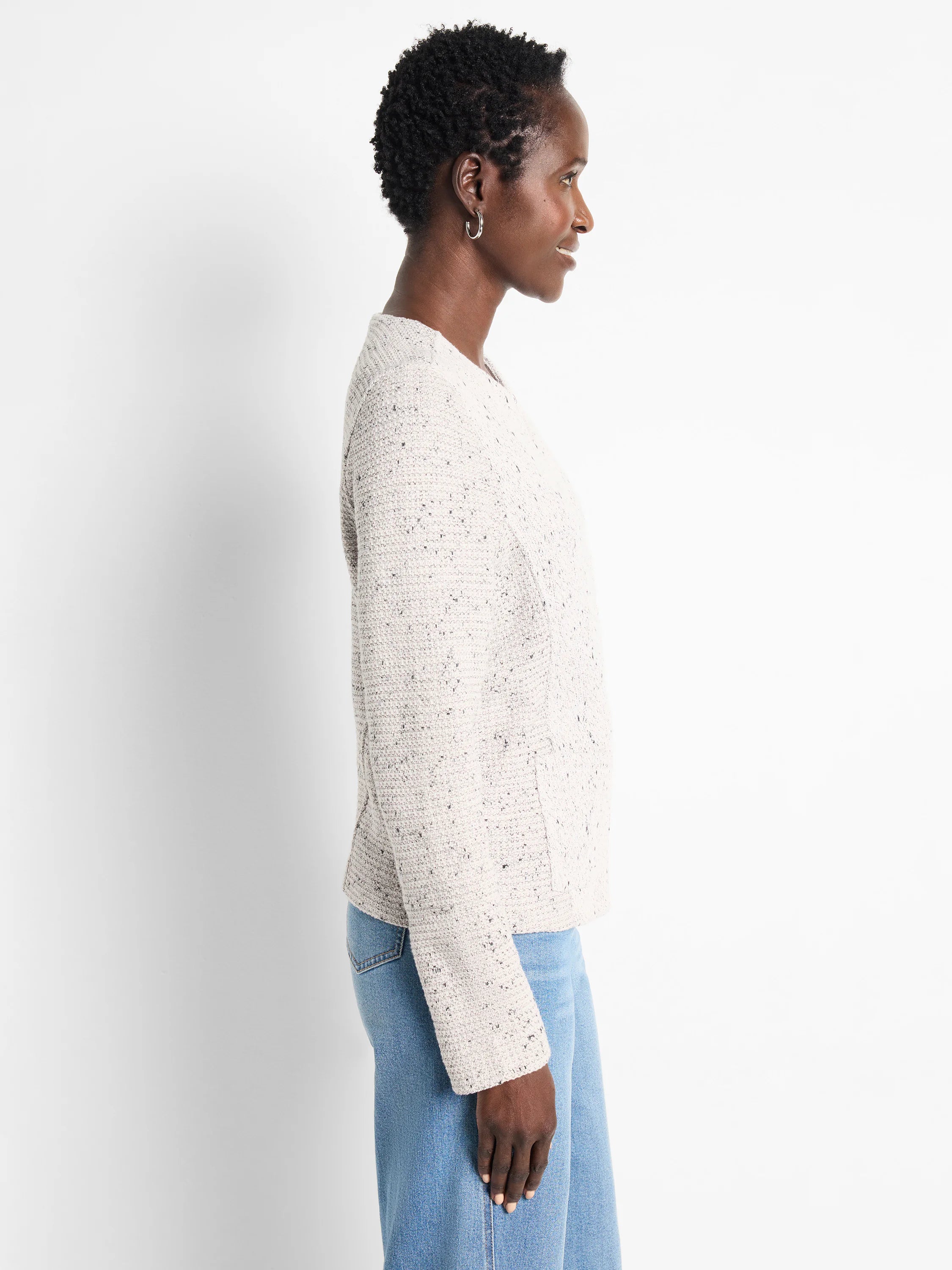 Light cream weave mix knit jacket with dark flecks, shown from the side.