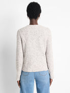 Light grey weave mix knit jacket with dark speckles, back view. Cropped cut, subtle shaped seams.