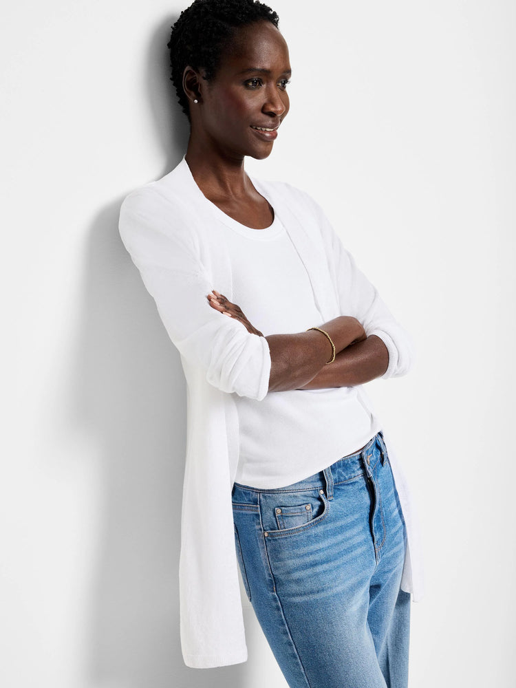 White open cardigan, long sleeves, shown on model.