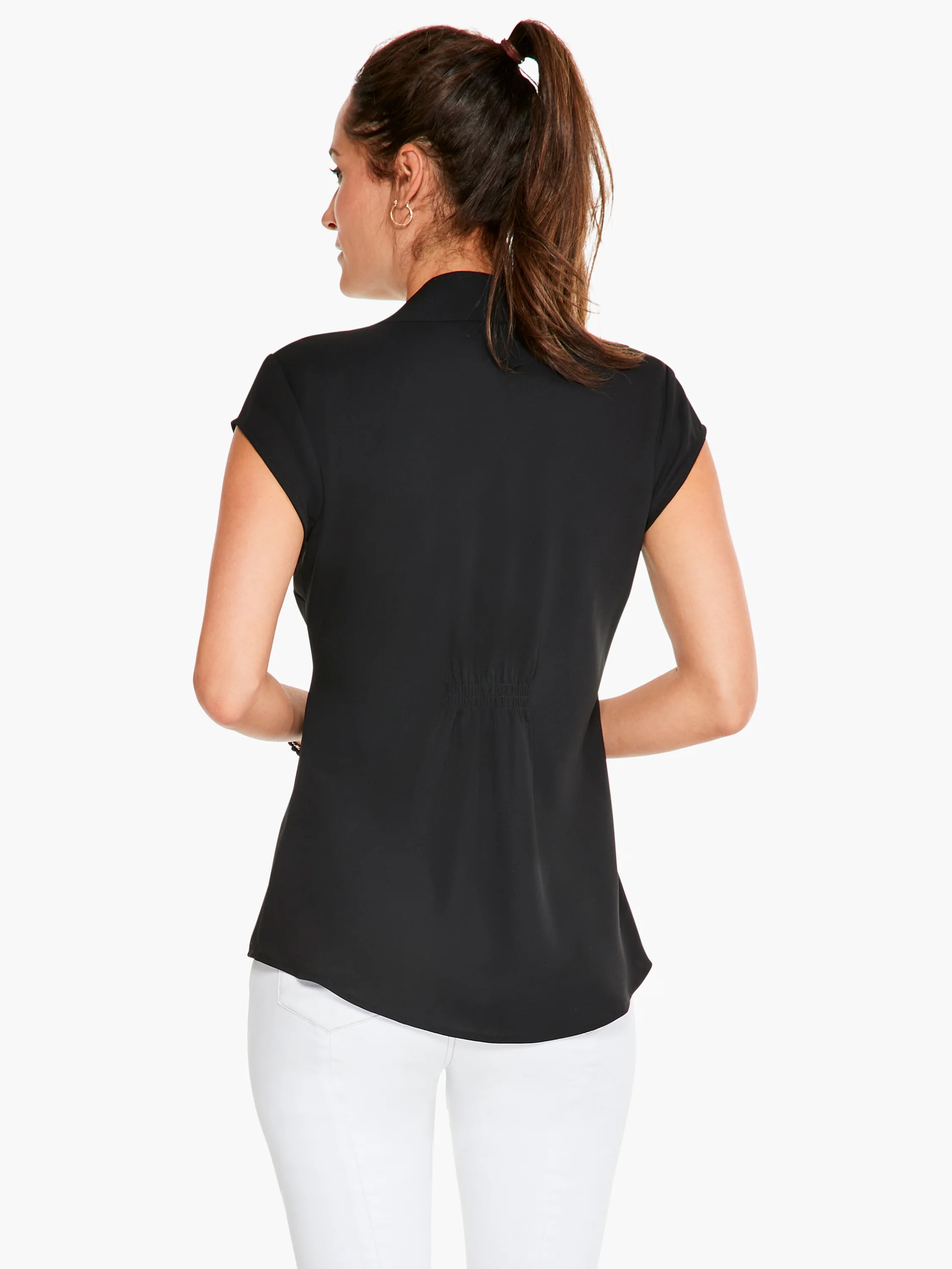 Black cap-sleeve top, rear view.  Elastic waistband detail.