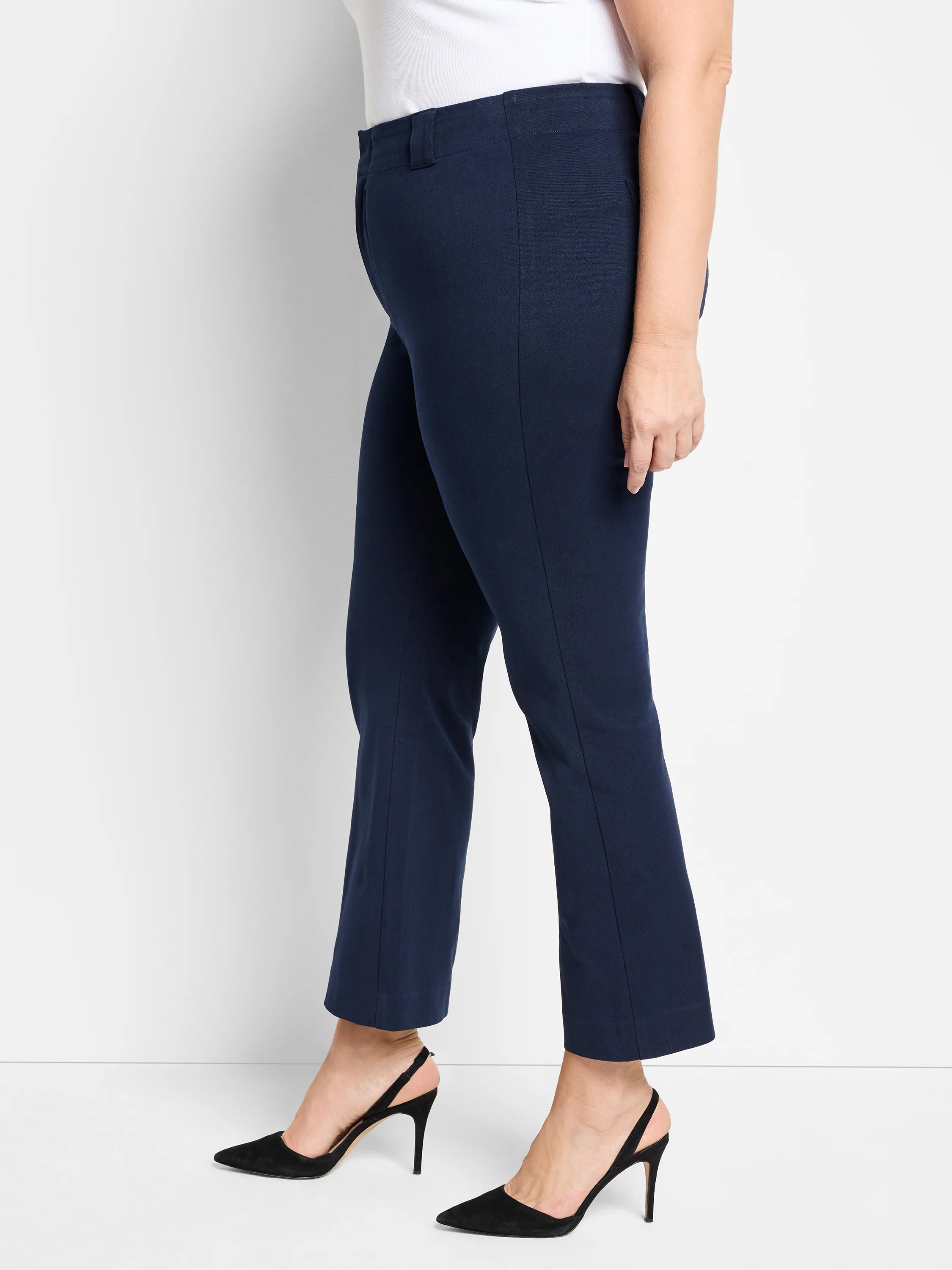 Navy blue demi boot pants with a subtle flare, ending above the ankle.