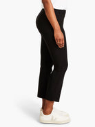 Black straight-leg cropped pants.  High-waisted, with side slits at the hem.