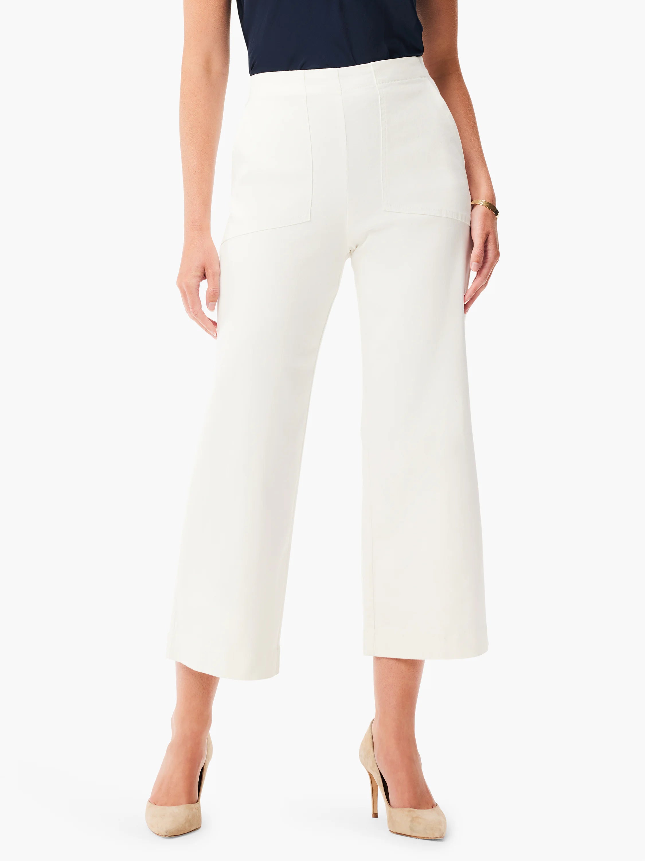 White wide-leg jeans, cropped length, with visible front seams and two patch pockets.
