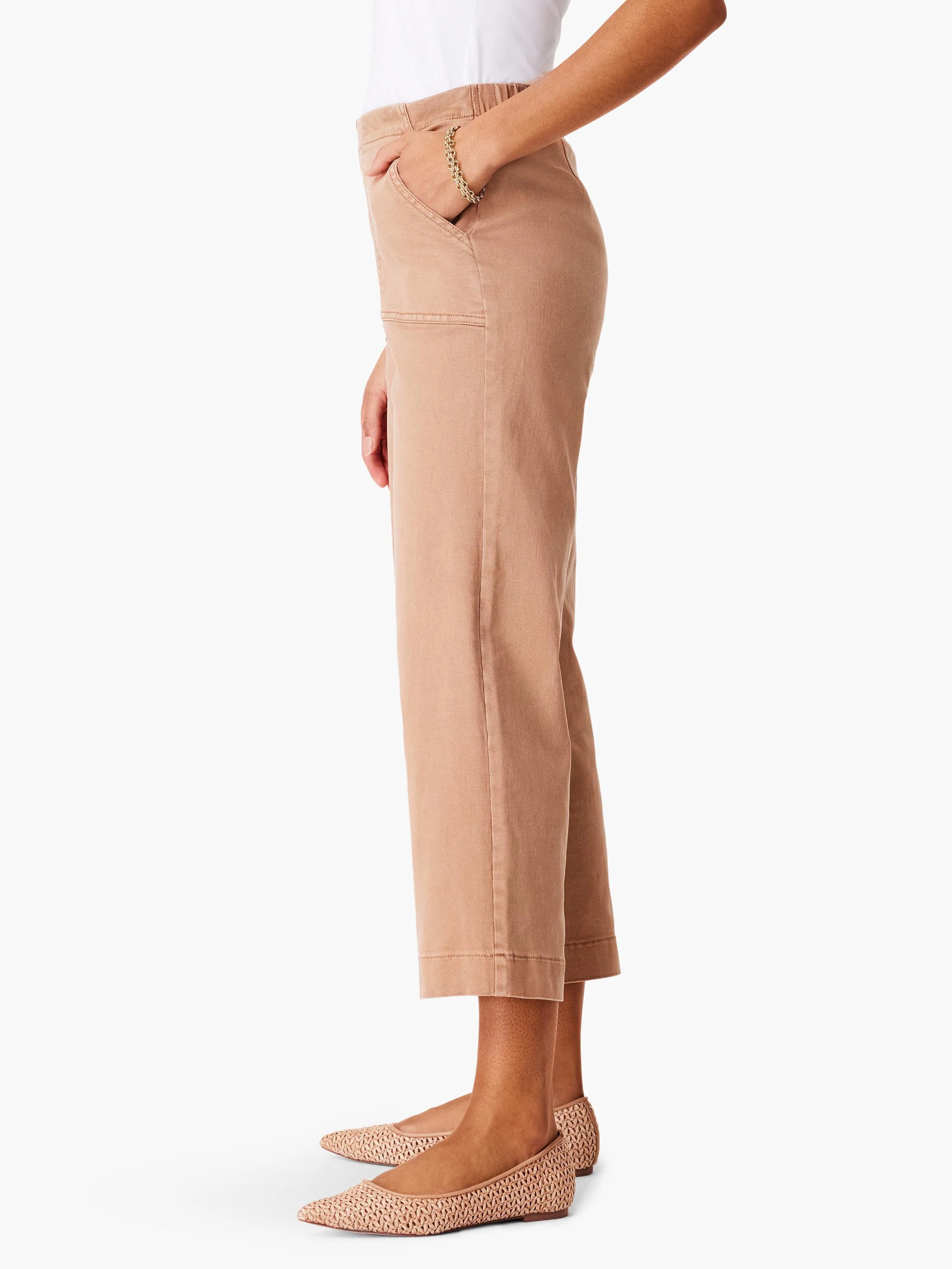 Tan wide-leg cropped jeans with front patch pockets.