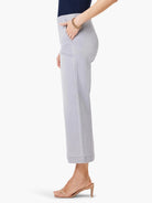 Light grey wide-leg jeans, cropped, with side pockets and a cuffed hem, shown from the side.