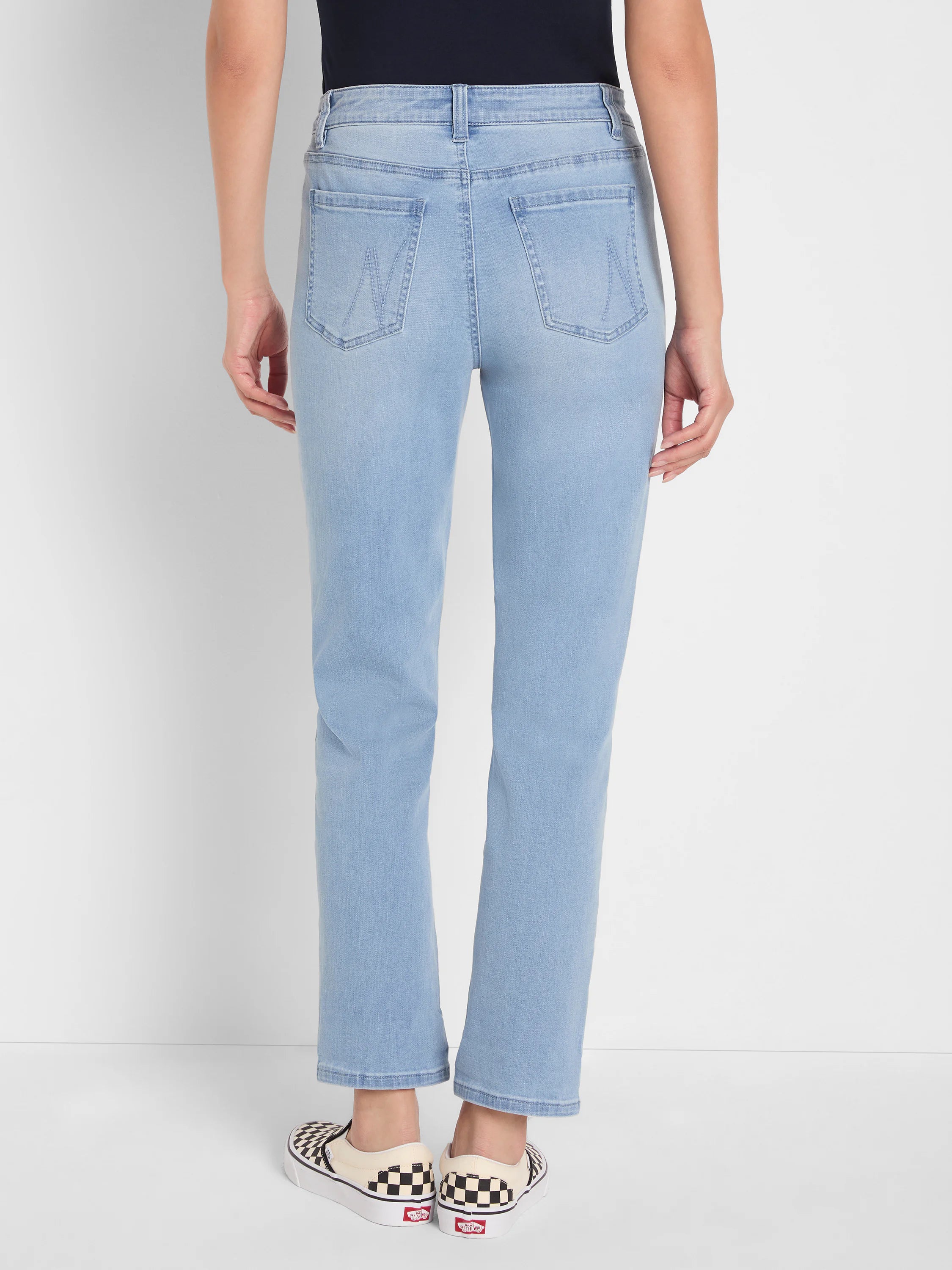 Back view: light blue mid-rise girlfriend jeans with straight, cropped legs and stitched back pockets.