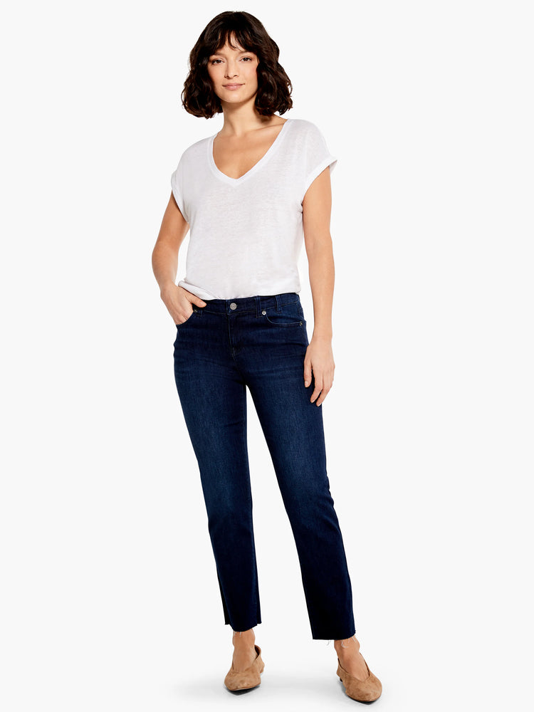 Dark wash straight ankle jeans with frayed hems.