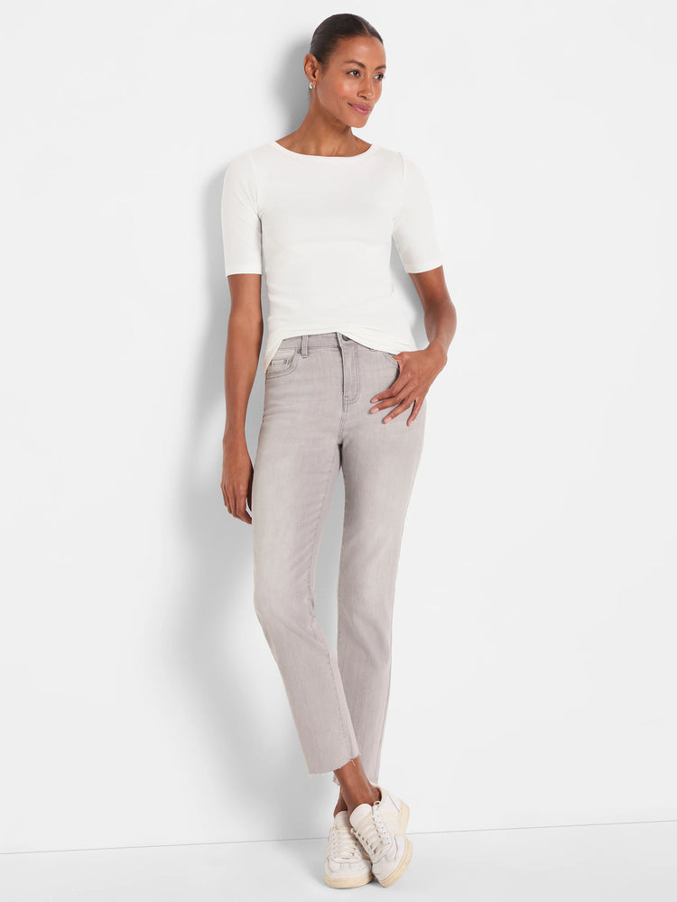Pale grey straight ankle jeans with a frayed hem.