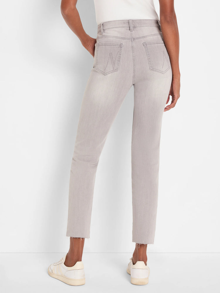 Back view of high-waisted, washed light gray straight ankle jeans with frayed hems.