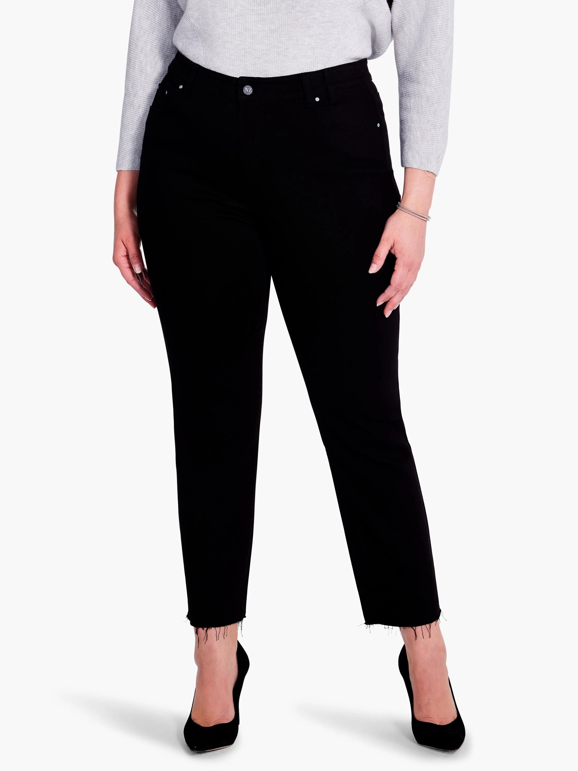Black straight ankle jeans with a raw, frayed hem. Features a silver button and rivets.