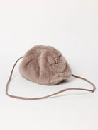 Taupe faux fur pouch clutch with a gathered top, thin matching strap, and gold-tone ring.
