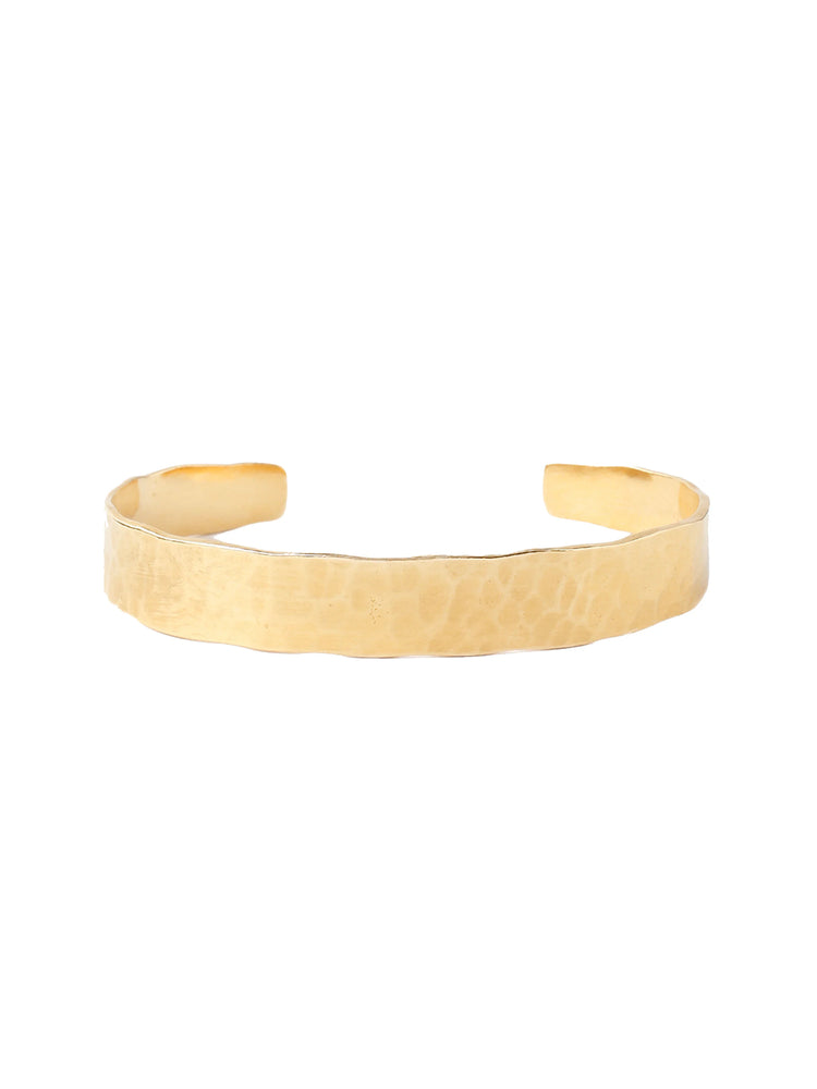 Gold hammered cuff bracelet; wide, slightly uneven band with textured surface.