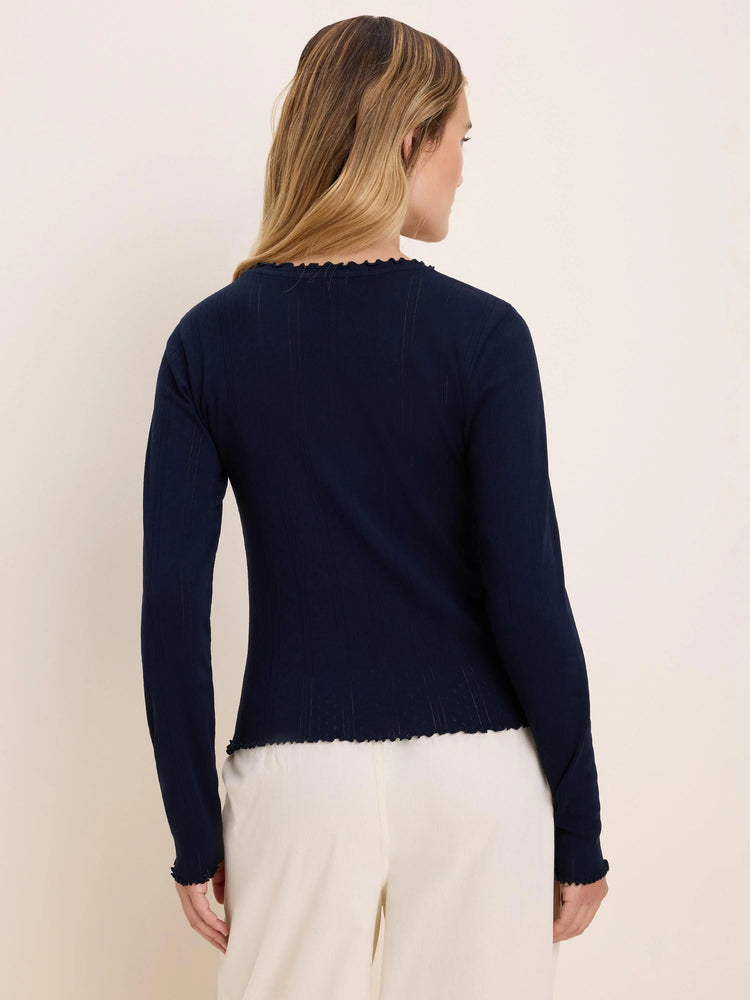 Navy pointelle rib long sleeve tee with scalloped edges at the neckline, cuffs, and hem.