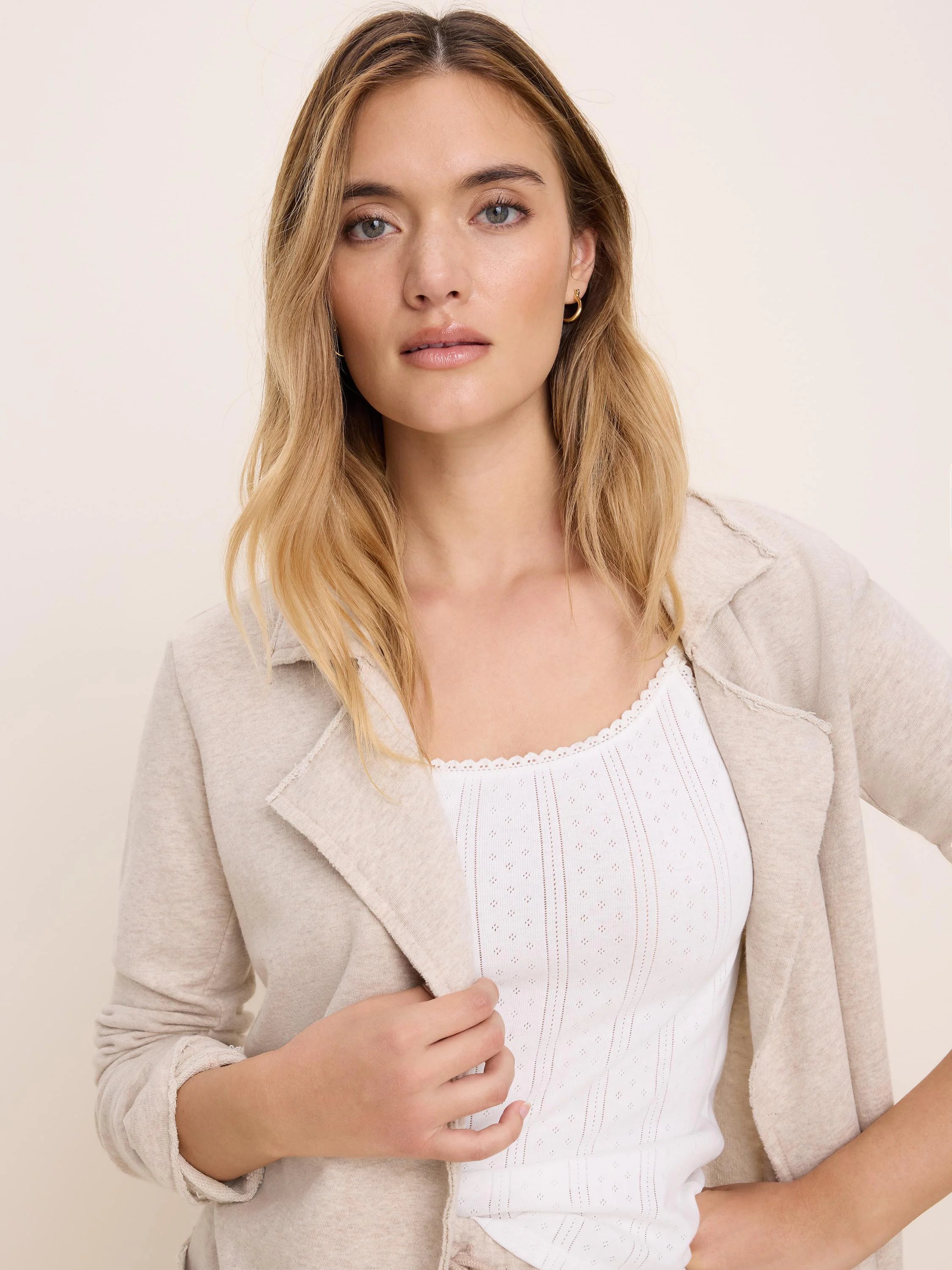 Oatmeal heathered French Terry jacket, open front with soft lapels and raw edges on seams.