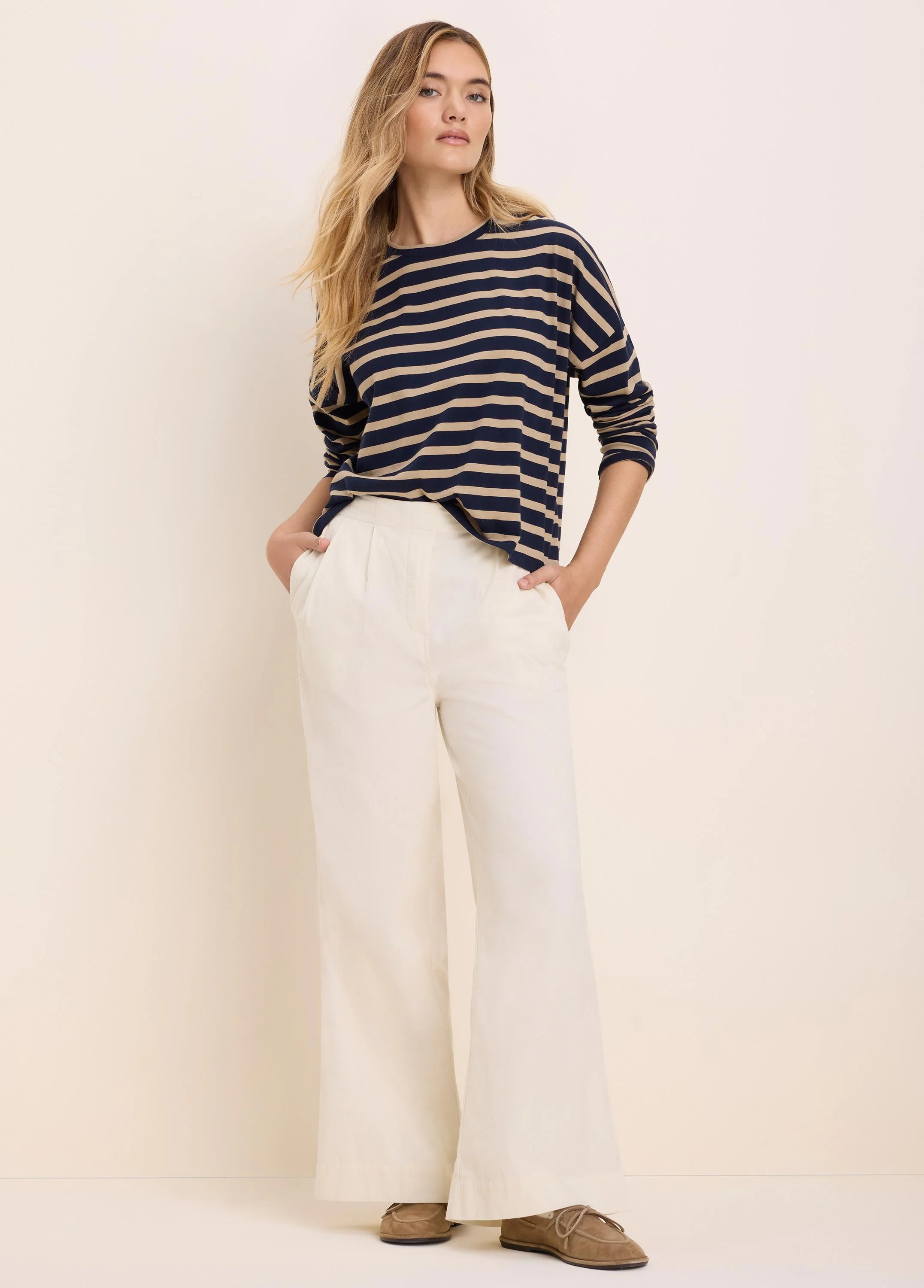 Navy and tan horizontal striped long-sleeve tee.