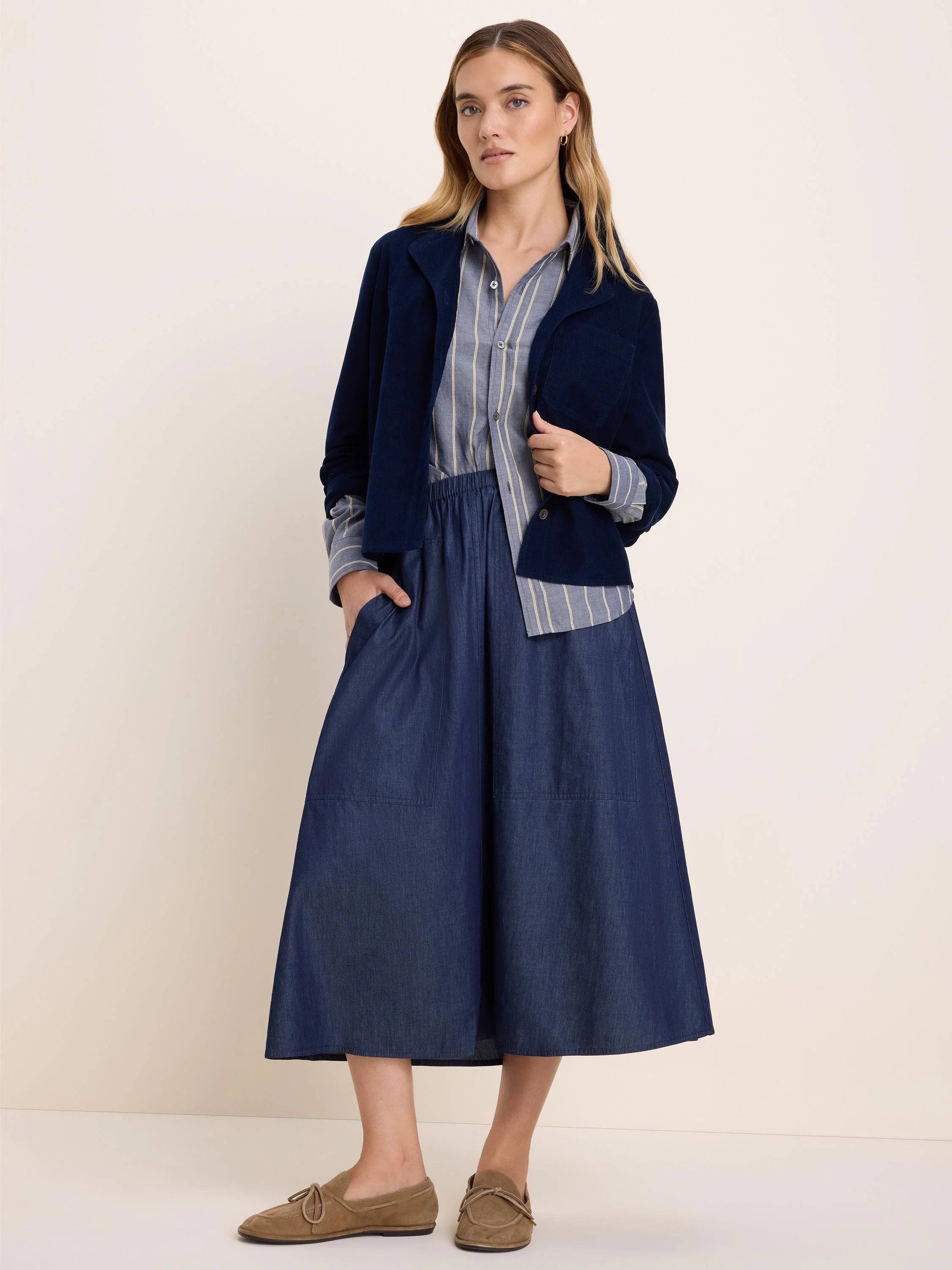 Light blue Dobby Stripe button-up shirt with thin cream vertical stripes.