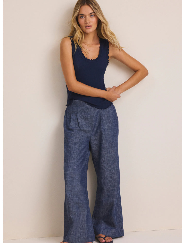 Dark navy ribbed tank top. Scalloped trim on the scoop neckline and armholes.