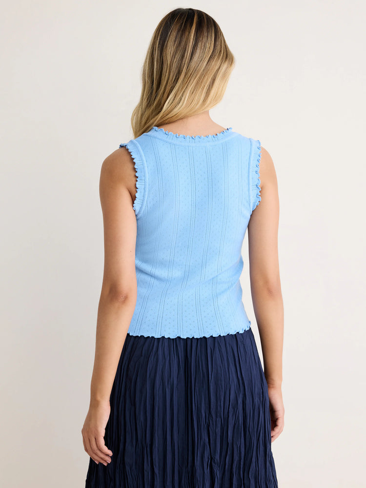 Light blue pointelle rib tank top with scalloped neckline, armholes, and hem.