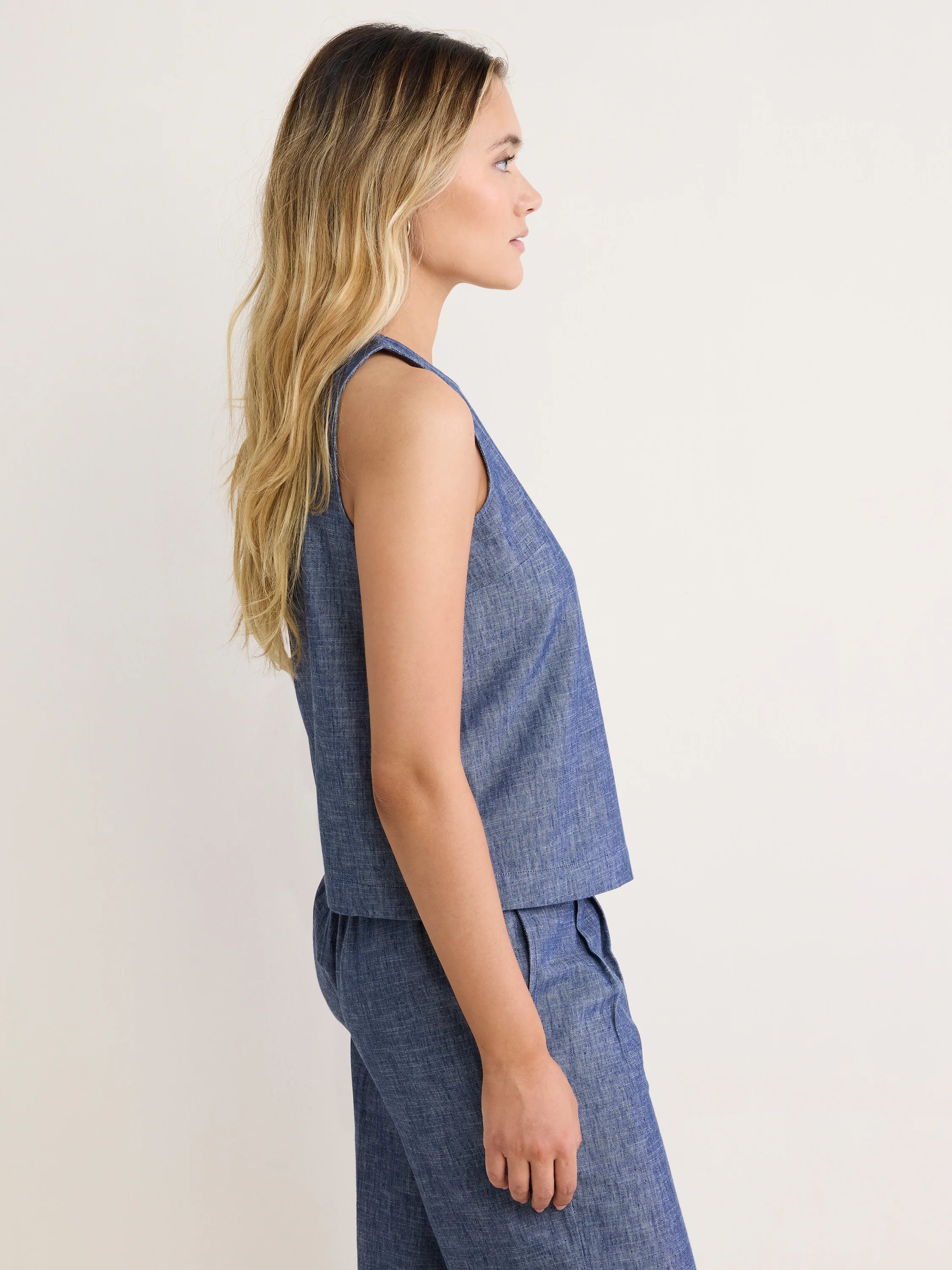 Mixed texture blue chambray tank, V-neck, sleeveless, and relaxed fit.