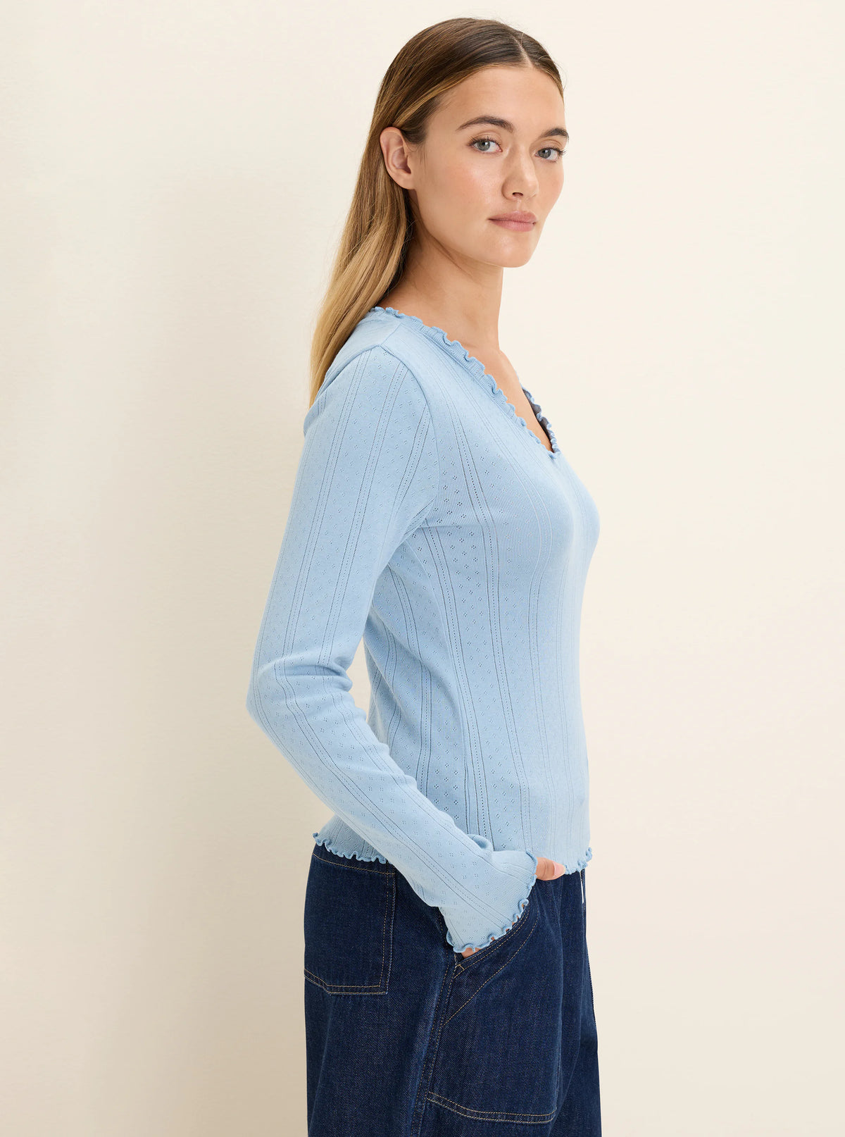 Light blue pointelle rib long sleeve tee, with ruffled V-neck and ruffled cuffs.