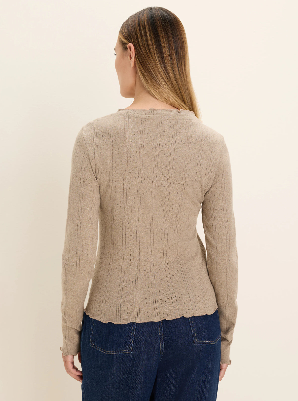 Light brown pointelle rib long sleeve tee with textured pattern & scalloped edges.