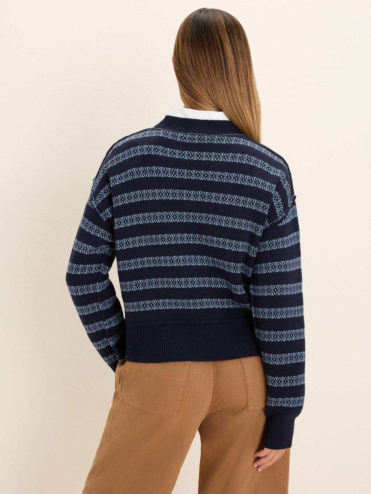 Navy blue cotton jacquard sweater with light blue geometric striped pattern.