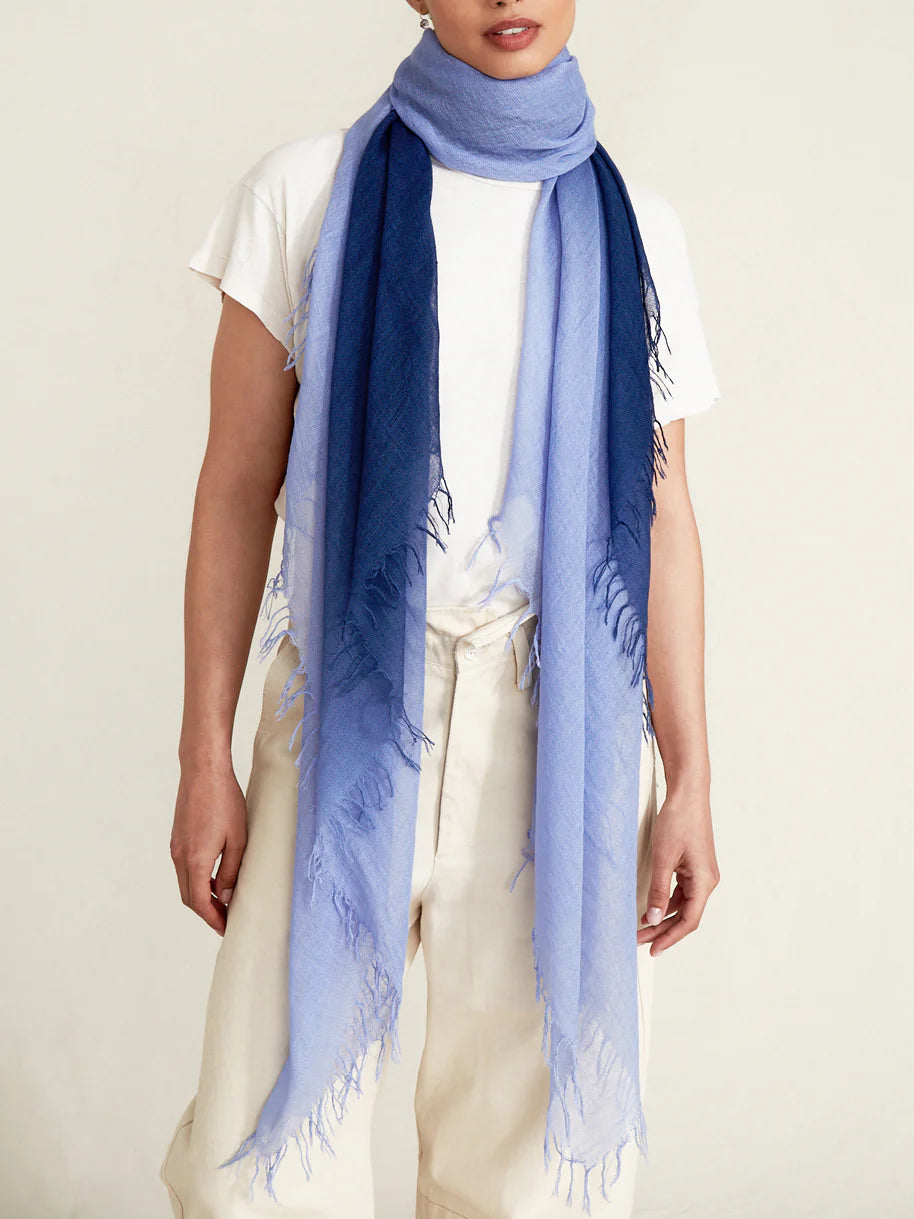 Dip-dye cashmere and silk scarf. Dark to light blue ombre effect. Raw edges.