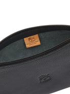 Black pebbled leather bag with a zipper. Dark blue-grey interior lining and a light brown leather label.